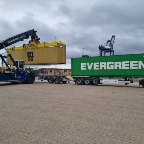 Container lift truck loading double container transport